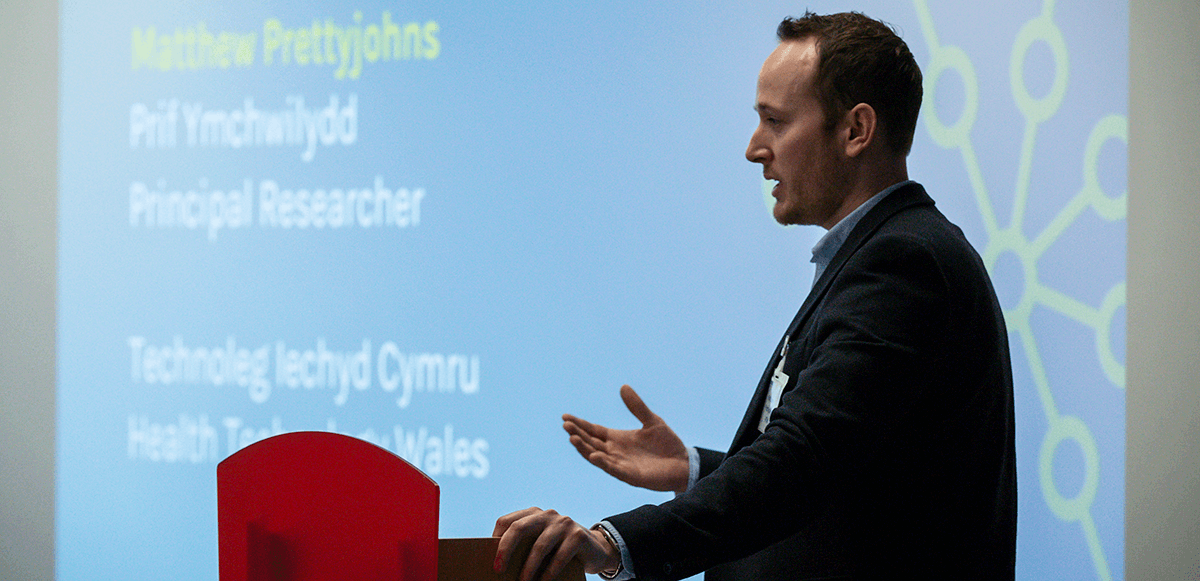 Matthew Prettyjohns from Health Technology Wales gives a talk.